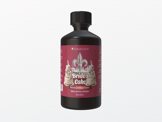 Fleur De Flavor Bride’s Cake Emulsion in 8 oz bottle with elegant maroon label, showcasing almond, vanilla, butter & citrus flavor for baking.