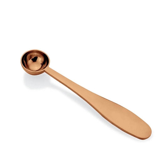 Single Fleur De Flavor Rose Gold Teaspoon featuring a sleek, durable design perfect for stylish and accurate baking in any kitchen setting.
